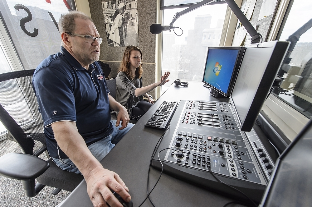 Photo: Dave Black and student at microphone