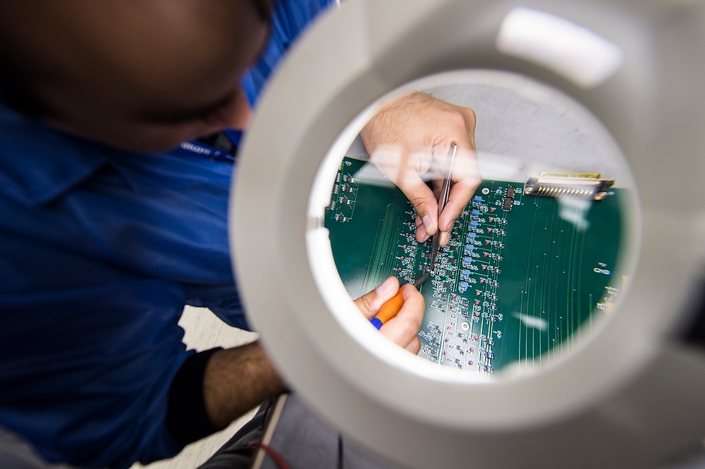 Photo: Worker at Astronautics