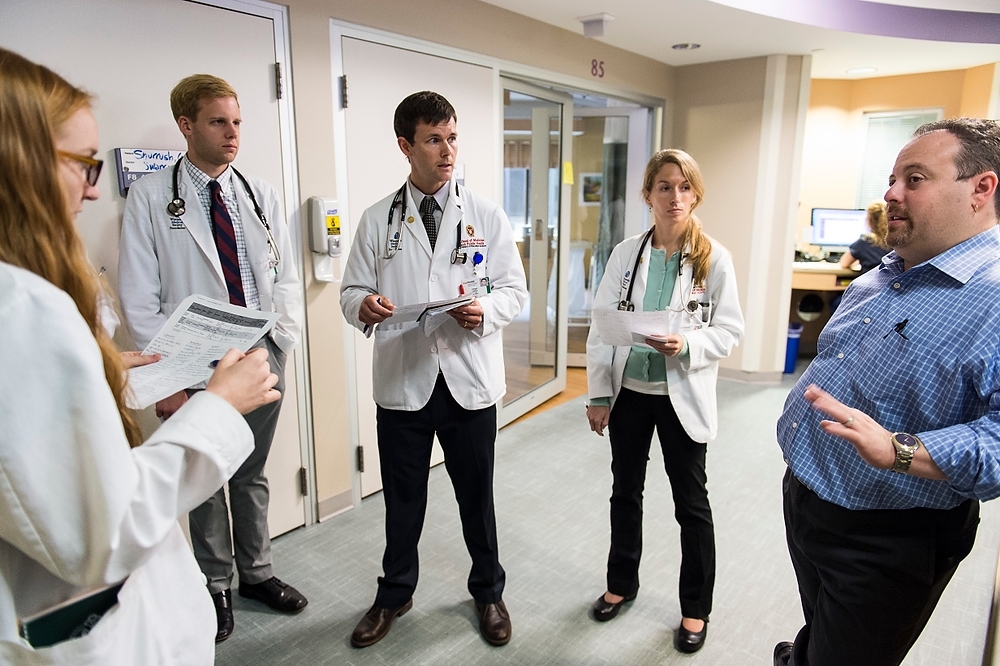 Photo: Josh Medow with medical students on rounds