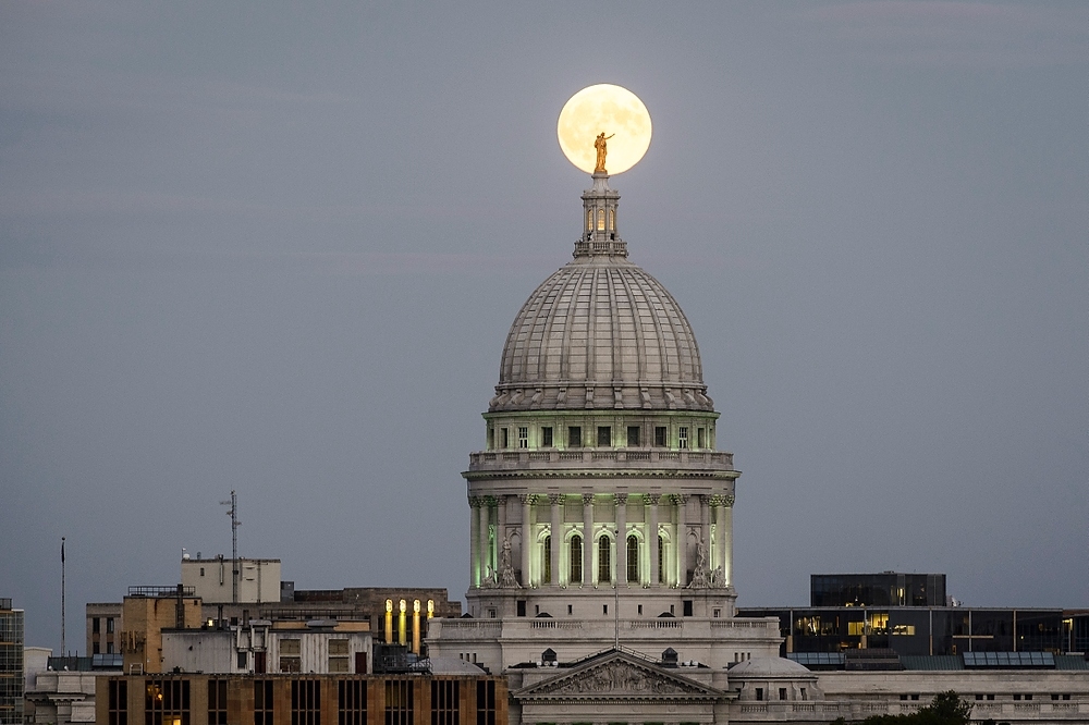 Photo: Moon behind Capitol dome statue