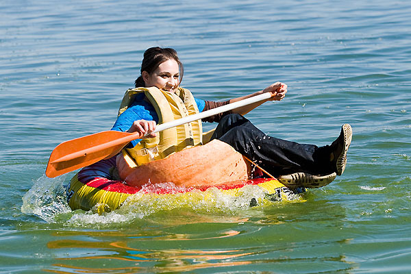 Photo: Student paddling in giant pumpkin
