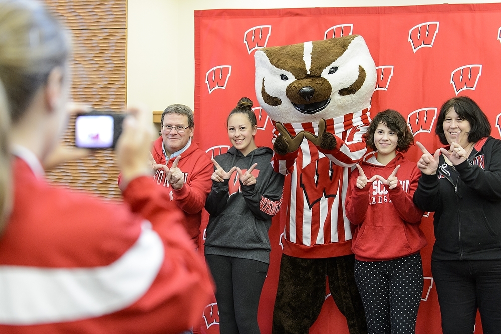 Photo: Family having picture taken with Bucky Badger