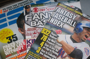 Photo of magazines dedicated to or showing lead stories about fantasy sports.