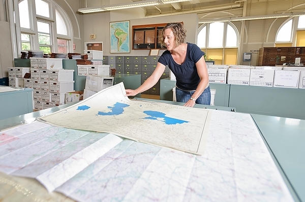 Photo: Jaime Stoltenberg looking at maps