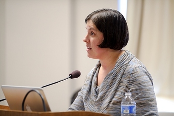 Photo: Heather Daniels speaking into microphone