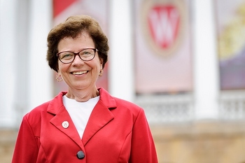 Photo: Rebecca Blank in front of banner