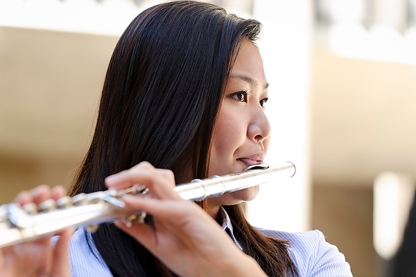Photo: Hinano Ishii playing flute