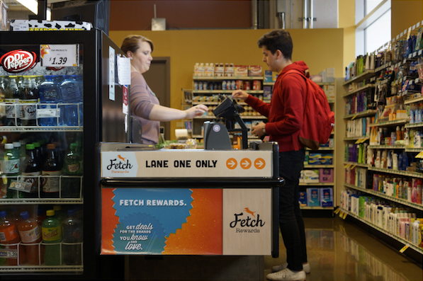 Photo: customer using Fetch checkout lane at grocery store