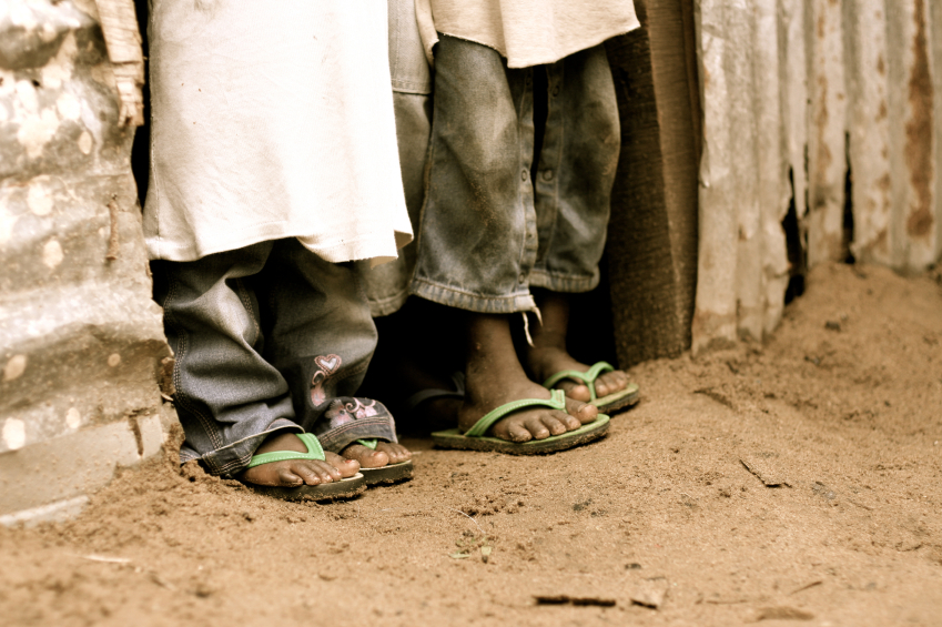 Photo: African children’s feet in flip-flops