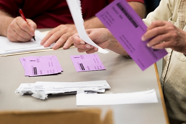 Photo: Classified staff election ballots being counted