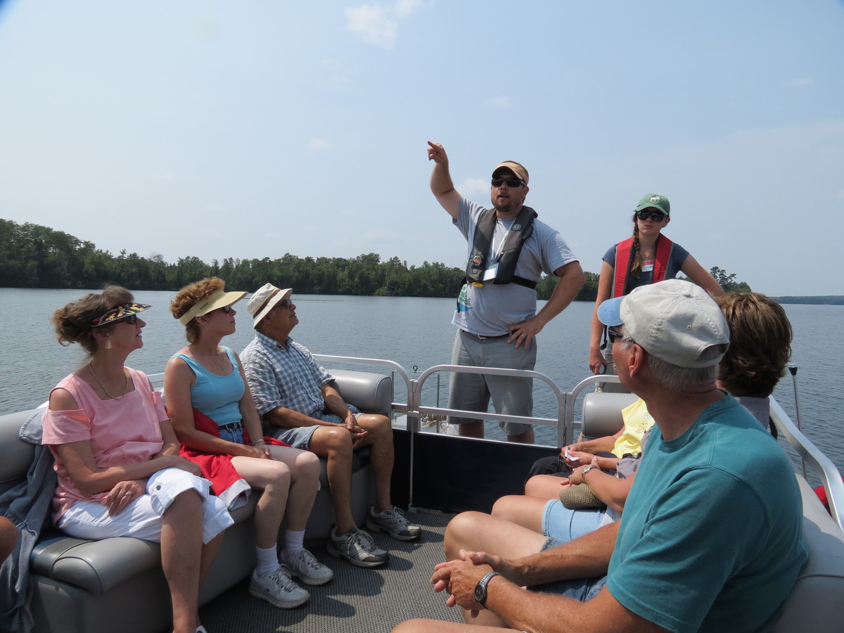 Photo: Trout Lake Station scientist leading boat tour