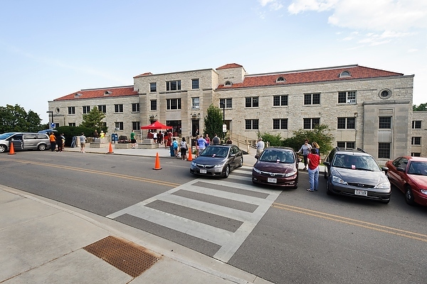 Photo: Cars parked in front of Elizabeth Waters Residence Hall