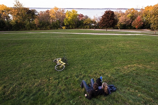 Photo: Couple gaze at Lake Mendota