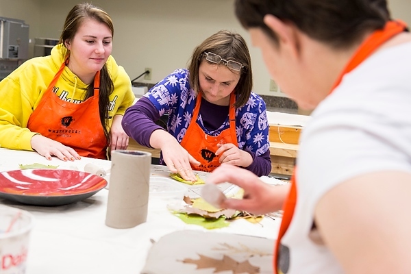 Photo: Crafting leaf impressions at LOV-Dane pottery course