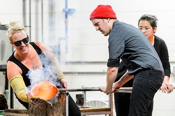 Photo: Mad Gaffers shaping a glass ornament