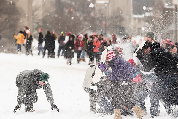 Photo: Battle for Bascom 2K15 participants dodge oncoming snow with trays