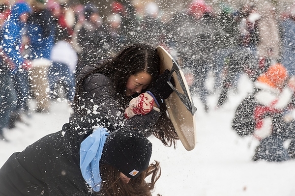 Photo: Battle for Bascom 2K15 participants take cover behind a tray