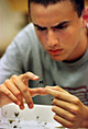 Photo of PEOPLE student preparing insect sample