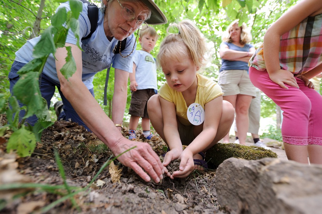  Tiny hands dig in the dirt with naturalist Colleen Feist during a UW-Madison Arboretum class that introduces three- to five-year-olds to the world of moles.

Words by Cindy Foss