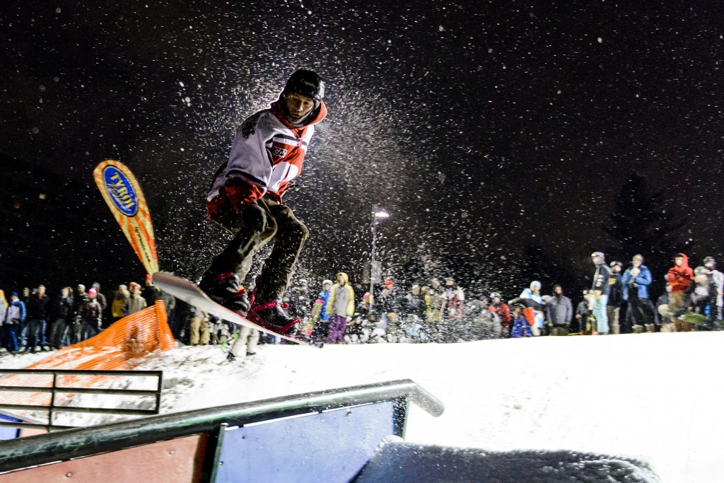 UW sophomore Tyler Cox competes during the Hoofers Winter Carnival Snowboard Rail Jam event on Observatory Hill. 