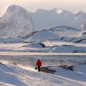 A fisherman walks toward open water in the Antarctic ice sheet. Conflicting research on the heating and cooling of Earth has led to a global temperature conundrum, which climate scientists plan to further address this fall.  