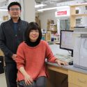 Chemistry Professor Kyoung-Shin Choi (right) and postdoctoral researcher Hyun Gil Cha (left) pose in their research lab.