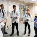 Josh Medow, right, medical director of the Neurocritical Intensive Care Unit at UW Hospital and Clinics, discusses a patientÕs progress with medical students during the groupÕs floor rounds on Aug. 18, 2015. Medow is also associate professor of neurological surgery in the School of Medicine and Public Health (SMPH) at the University of Wisconsin-Madison. (Photo by Jeff Miller/UW-Madison)