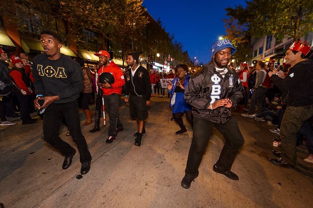 Members of several fraternities, including Alpha Phi Alpha and Phi Beta Sigma, danced their way down State Street as the procession continued.
