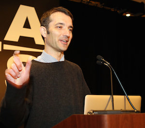 Sebastian Heinz presents a lecture to the American Astronomical Society in 2014. 