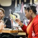 UW student Ashley Thomas takes part in the Body Positivity and Black Sexuality Paint Night workshop event held in collaboration with the Delta Sigma Theta Sorority at Wheelhouse Studios at the Memorial Union  on Feb. 20. The event featured painting instruction by Ashley Robertson. 