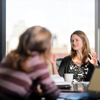 Holly Gibbs, Assistant Professor in the Department of Geography, meets with her graduate research students in the Wisconsin Energy Institute at the University of Wisconsin-Madison on Feb. 10, 2016. Gibbs is one of twelve 2016 Distinguished Teaching Award recipients. (Photo by Bryce Richter / UW-Madison)