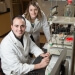 Jon Behringer and Darcia Schweitzer, participants in the M.S. in biotechnology degree program, in the Biomanufacturing Teaching Lab at the MG&E Innovation Center in UW–Madison’s University Research Park.
