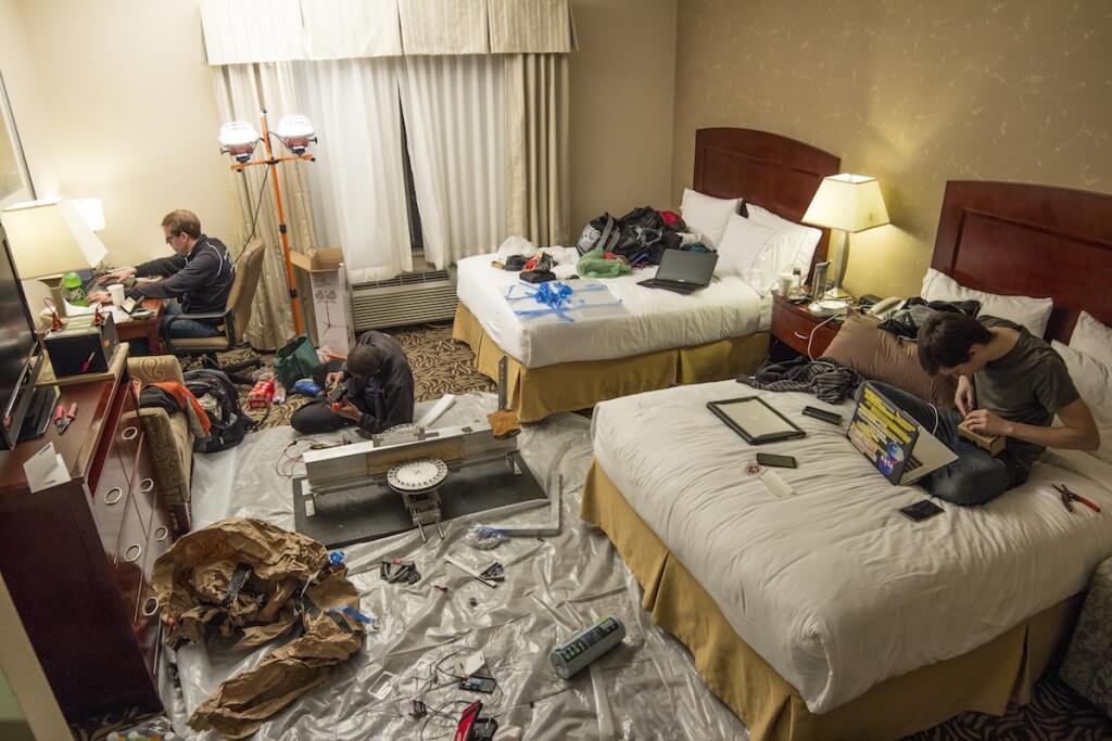 After making the road trip to Texas for SpaceX’s Hyperloop Pod Competition Design Weekend, members of the UW–Madison BadgerLoop team converted one of their hotel rooms into a workspace to assemble and prep the various demos for their exhibit booth. 