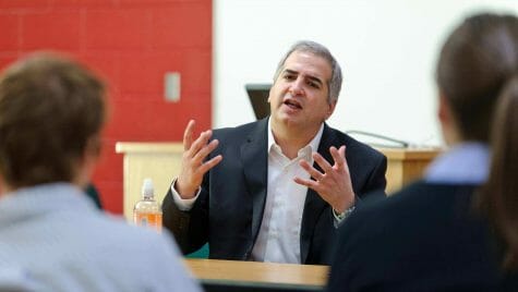 Anthony Shadid (center) speaks to a group of journalism students in a Vilas Hall classroom in December 2010.