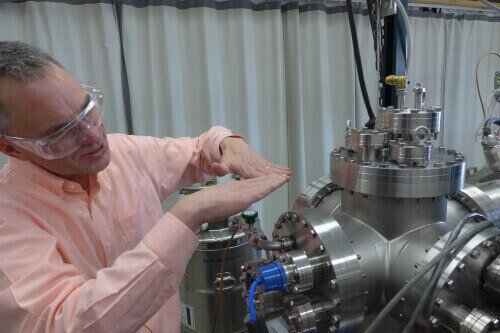 Mark Ediger, professor of chemistry, makes organic glasses in this vacuum apparatus.