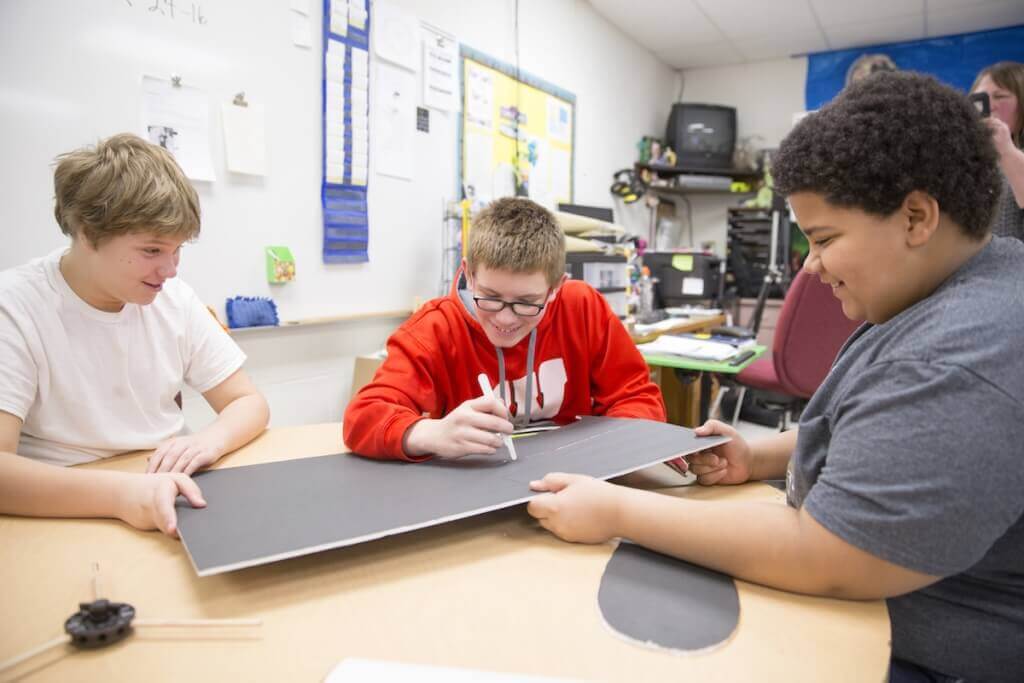 Photo: North Crawford students cut blades for wind turbines as part of lessons on energy their teacher, Lisa Andresen, created after attending courses for educators at the Wisconsin Energy Institute