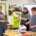North Crawford students test a classroom-scale wind turbine as part of lessons on energy their teacher, Lisa Andresen, second from right, created after attending courses for educators at the Wisconsin Energy Institute.
