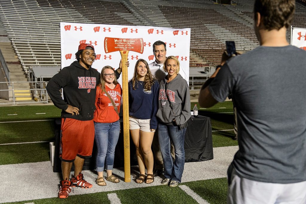 Photo: Corey Clement, Paul Chryst and fans posing for picture