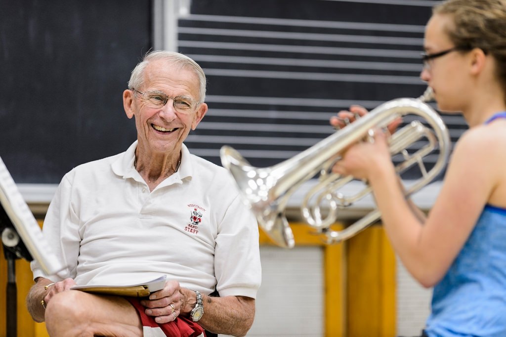 Photo: Leckrone listens for Marching Band potential in incoming first-year student Katie Bina's mellophone audition.