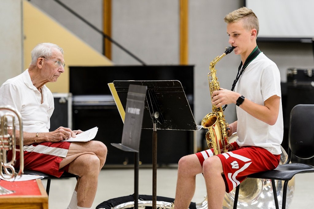 Photo: Incoming first-year student Evan Michael Willis plays alto saxophone, competing for a position in the approximately 300-member ranks of the Wisconsin Marching Band.
