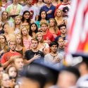 First-year students stand at attention for the singing of the national anthem at the start of the Chancellor's Convocation on Sept. 2.