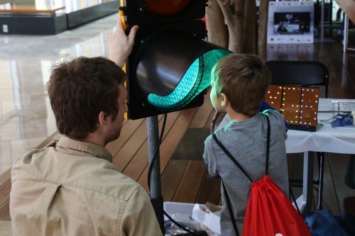 Photo: Visitors explored the concepts of light and wavelengths at the 2015 Wisconsin Science Festival’s Discovery Expo. The Discovery Expo is a hands-on, family-friendly event that takes place in the Discovery Building over all four days of the festival.