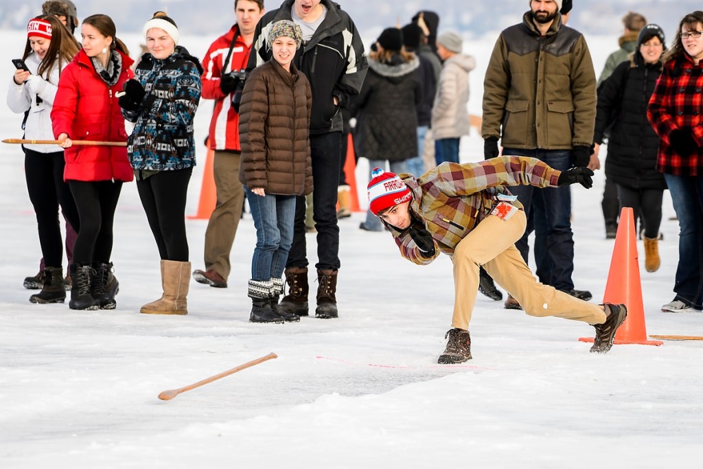 Photo: Participant throwing snow snake