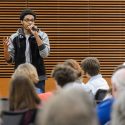 UW student Deshawn McKinney speaks during a public roundtable discussion in 2014.