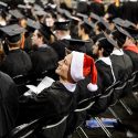 A graduate wearing a Santa hat adds a pop of color to the winter commencement in 2015. This year's winter commencement is Dec. 18.