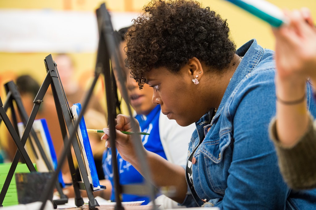 LeAnna Level takes part in an art project during a Martin Luther King Day Celebration at Union South.