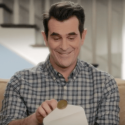 Photo: TV character Phil Dunphy opening envelope