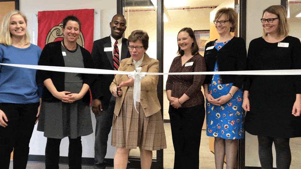 This is GIF motion file of ceremonial ribbon cutting that Chancellor Rebecca Blank cuts the ribbon for the grand opening of Career Exploration Center at Ingraham Hall.