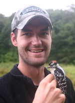 Photo: Christopher Latimer holding small bird