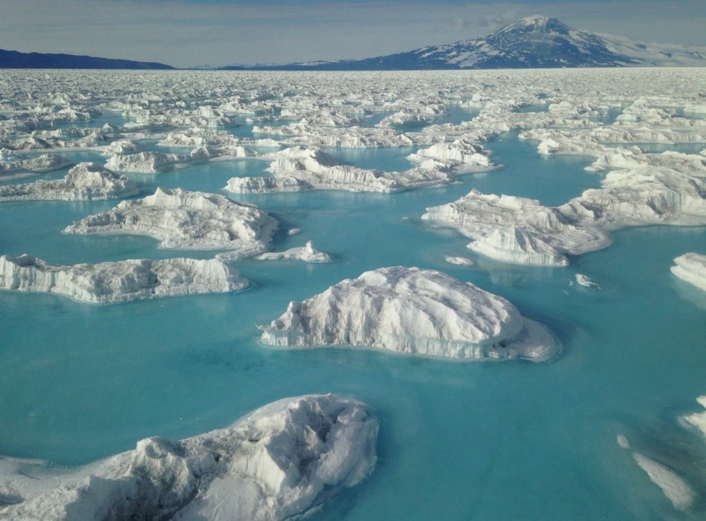 Photo: Antarctic landscape with blue ice, formed due to ice compression, sublimation, and high winds.